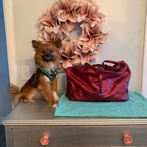 EUC Tiffany metallic reversible suede bag with wristlet. Dust bag included.